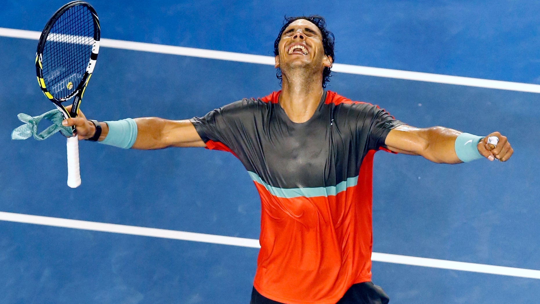 Rafael Nadal celebrates his win over Gael Monfils at the Australian Open in Melbourne, on Jan. 18, 2014.