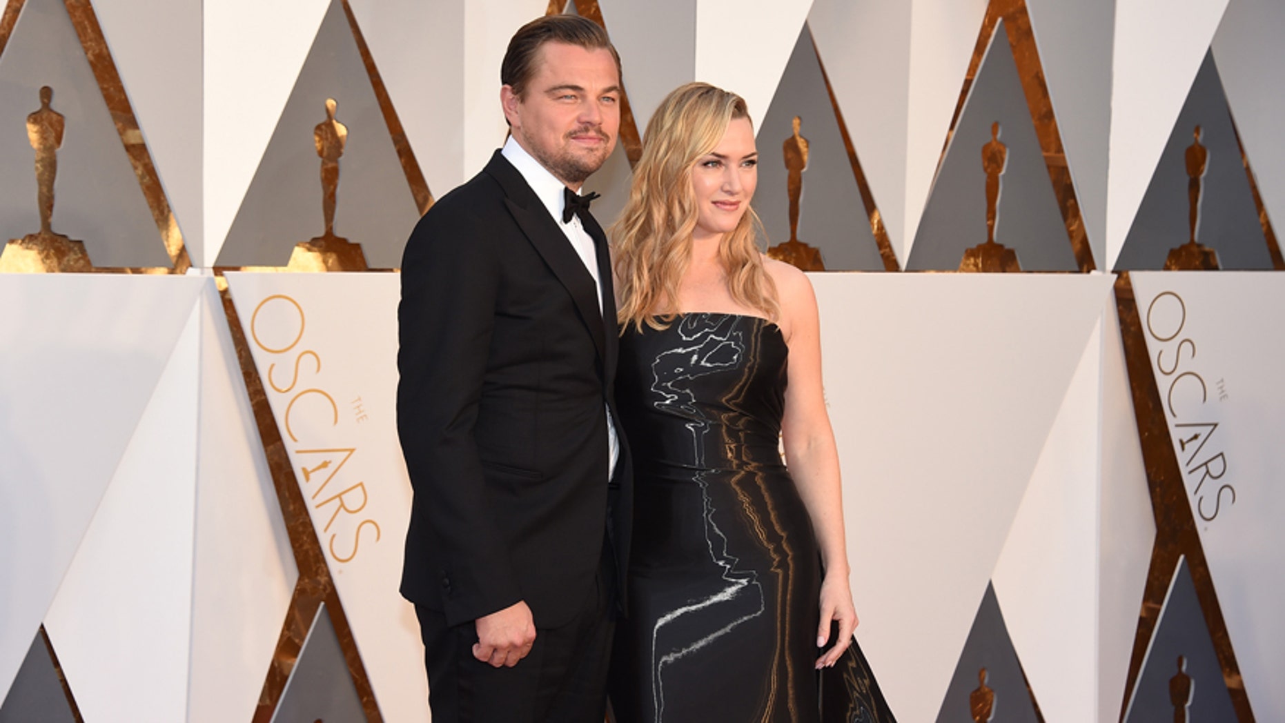 Leonardo DiCaprio, left, and Kate Winslet arrive at the Oscars on Sunday, Feb. 28, 2016, at the Dolby Theatre in Los Angeles.