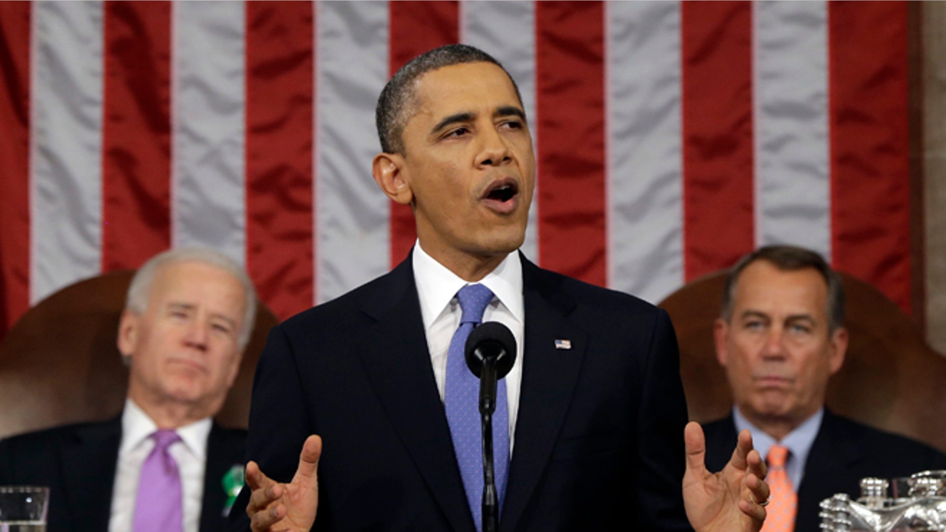 President Barack Obama, flanked by Vice President Joe Biden and House Speaker John Boehner of Ohio, gives his State of the Union address during a joint session of Congress on Capitol Hill in Washington, Tuesday Feb. 12, 2013. (AP Photo/Charles Dharapak, Pool)