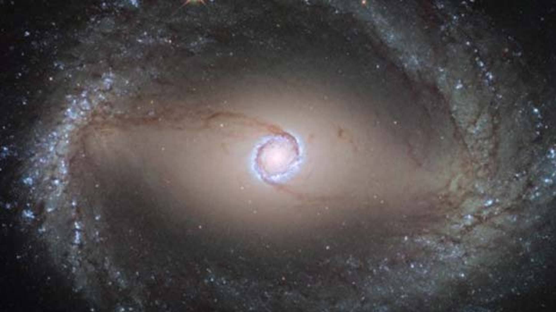 The Hubble Space Telescope was used to capture imagery of spiral galaxy NGC 1512.