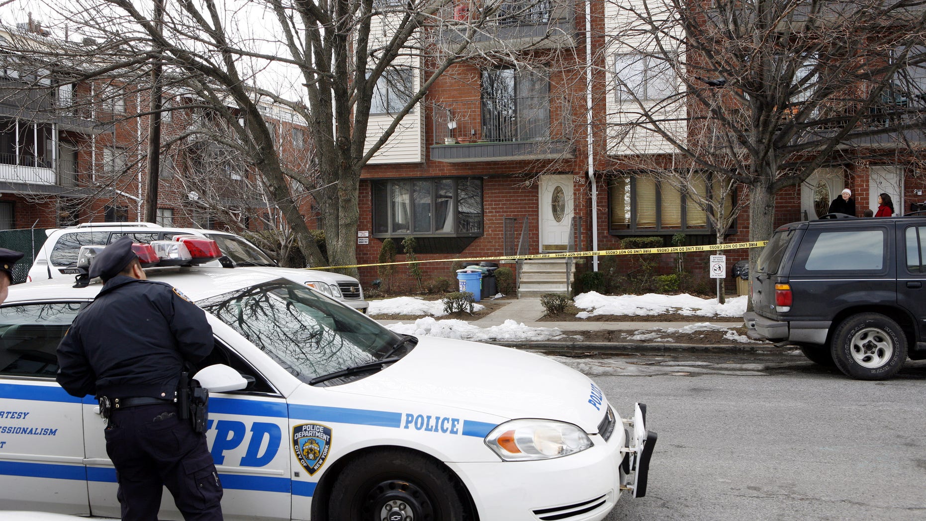 Feb. 12: Police stand outside the house in the Brooklyn borough of New York where Maksim Gelman lived and where police say he killed his stepfather on Friday morning. The 23-year-old Brooklyn man was in custody Saturday after a 28-hour stabbing rampage that took the lives of his stepfather, his ex-girlfriend and her mother, and led to a nightlong manhunt across New York City, police said. Authorities said Gelman also hijacked a car, stabbing and wounding the driver and fatally hitting a pedestrian. (AP)