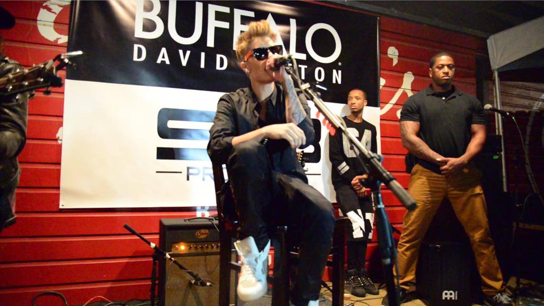 This Sunday, March 9, 2014 photo released courtesy of Op and Buffalo David Bitton shows Justin Bieber performing at the Scooter Braun Projects “Sunday Funday Showcase” at South By SouthWest, sponsored by Op and Buffalo David Bitton, in Austin, Texas. (AP Photo/Op and Buffalo David Bitton)
