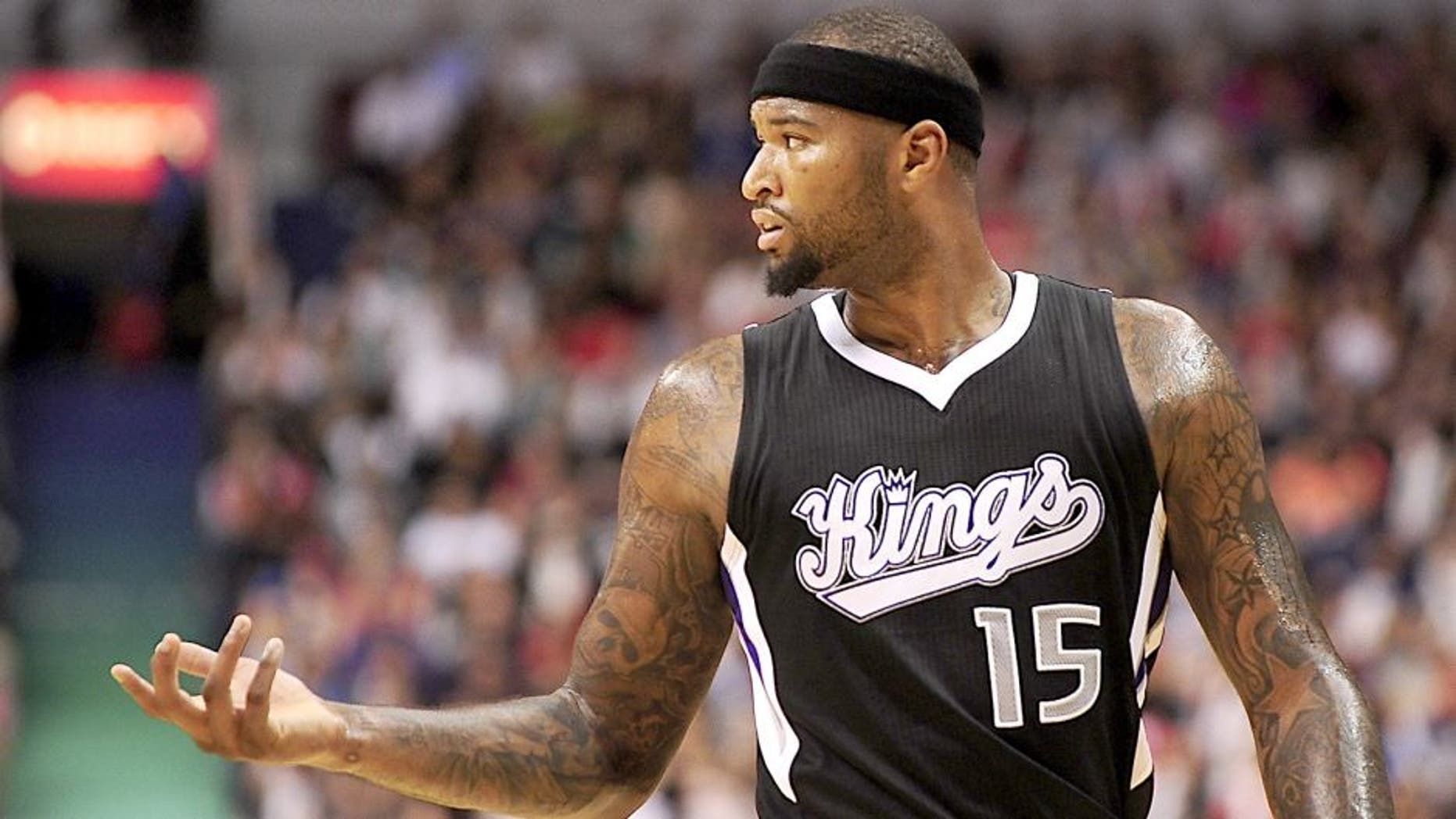 Oct 5, 2014; Vancouver, British Columbia, CAN; Sacramento Kings center DeMarcus Cousins (15) gestures during the first half against the Toronto Raptors at Rogers Arena. Mandatory Credit: Anne-Marie Sorvin-USA TODAY Sports