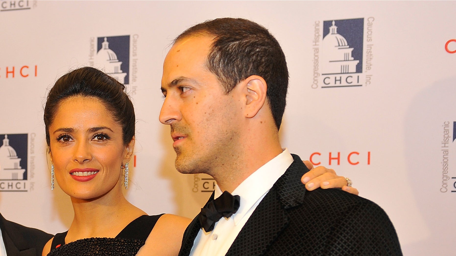 WASHINGTON, DC - OCTOBER 02: Salma Hayek poses for a photo with her father, Sami, left and her brother, Sami Junior, right, at the Congressional Hispanic Caucus Institute 2013 gala> at The Walter E. Washington Convention Center on October 2, 2013 in Washington, DC. (Photo by Larry French/Getty Images)