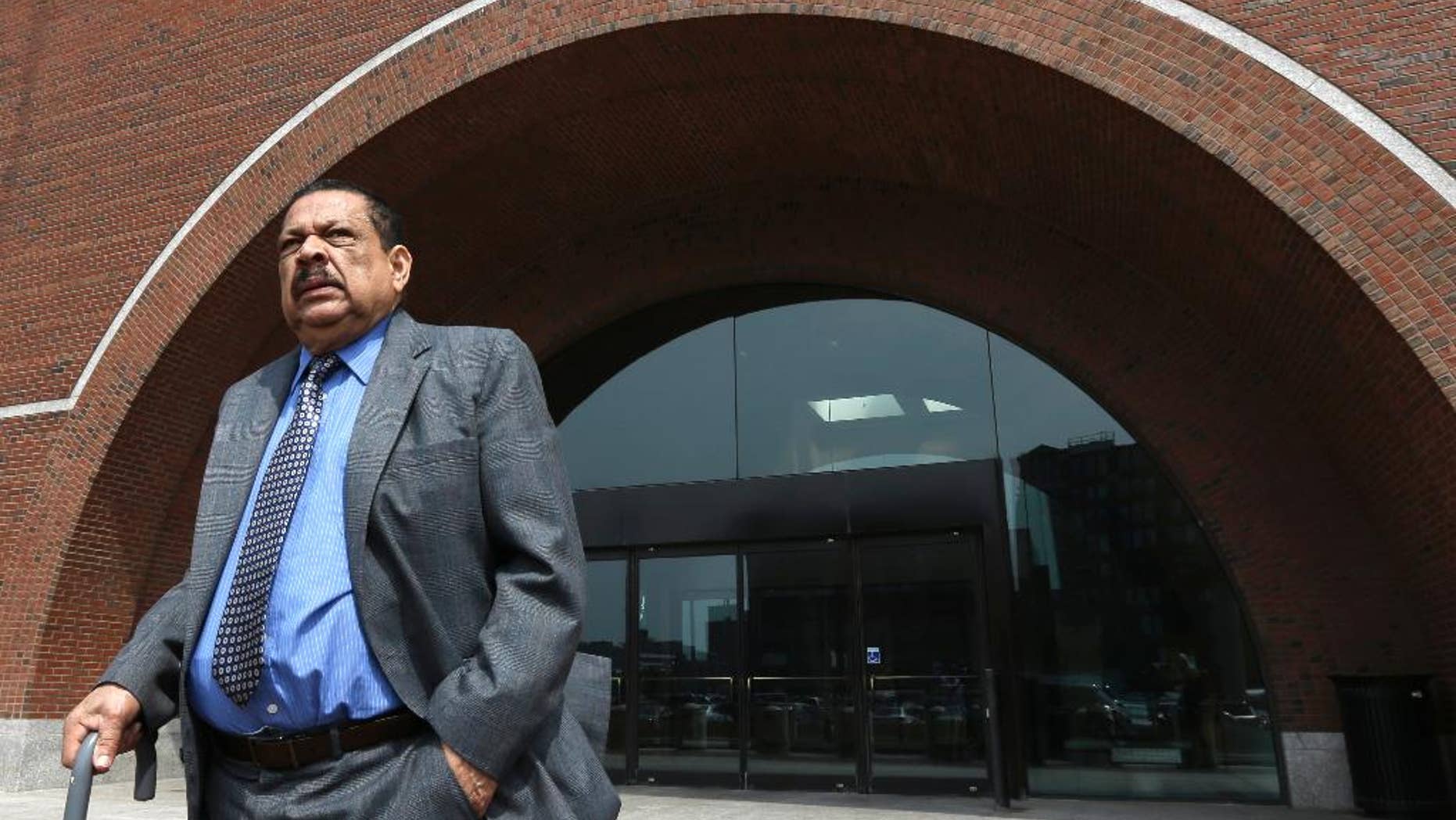 FILE - In an Aug. 22, 2013 file photo, former El Salvadoran military Col. Inocente Orlando Montano Morales departs federal court, in Boston. The U.S. government is working to extradite the former Salvadoran colonel to face charges that he helped plot the 1989 slayings of five Jesuit priests from Spain during El Salvador’s civil war, prosecutors said Wednesday, April 8, 2015. (AP Photo/Steven Senne, File)