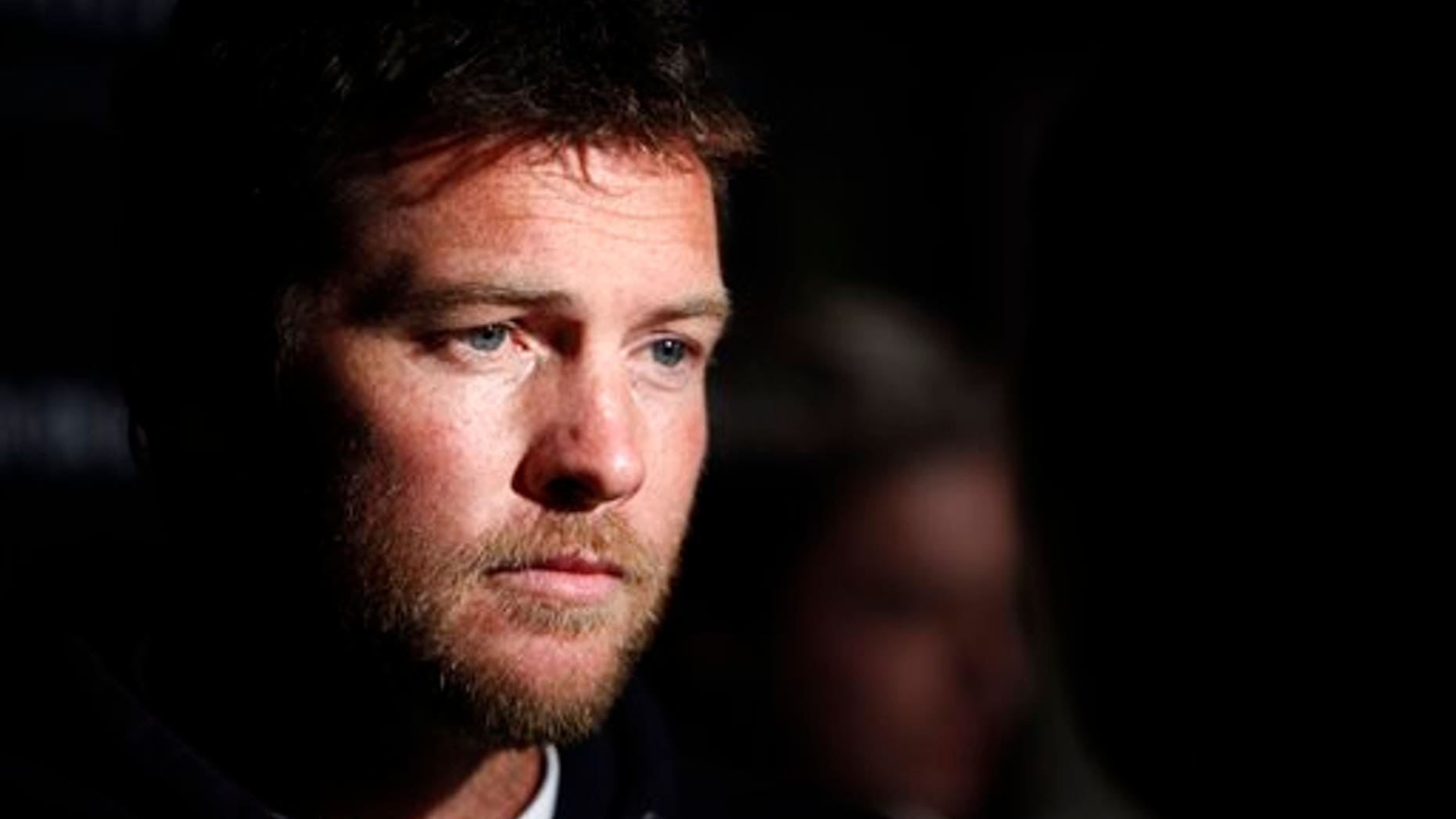 FILE - In this Jan. 19, 2012 file photo, Actor Sam Worthington attends the Cinema Society premiere of "Man on a Ledge" in New York. Police say Worthington has been arrested Sunday, Feb. 23, 2014, in New York City for punching a photographer after the man kicked Worthington's girlfriend in the shin. The Australian actor was released on a desk appearance ticket and is due back in court on Feb. 26. (AP Photo/Peter Kramer, File)