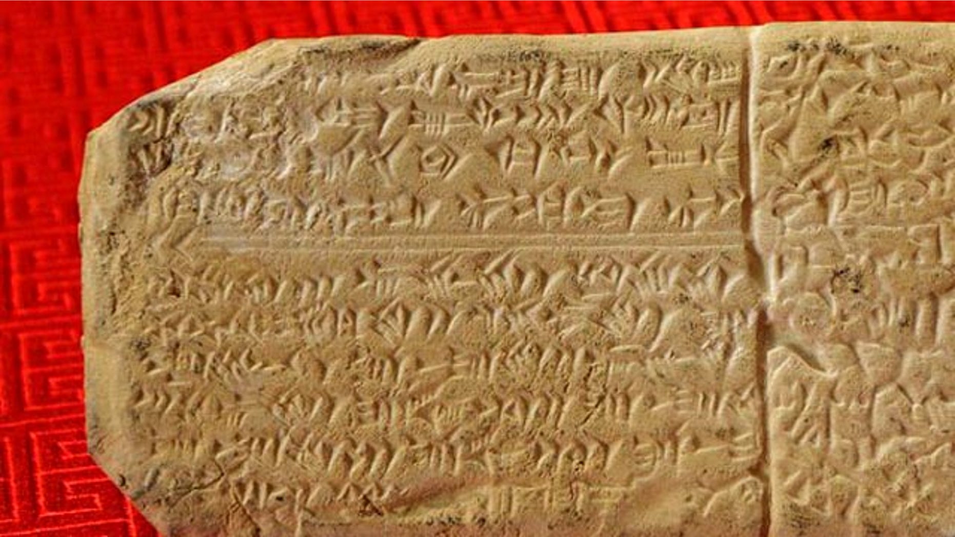 A sample of Ugaritic script on a gift-shop replica.