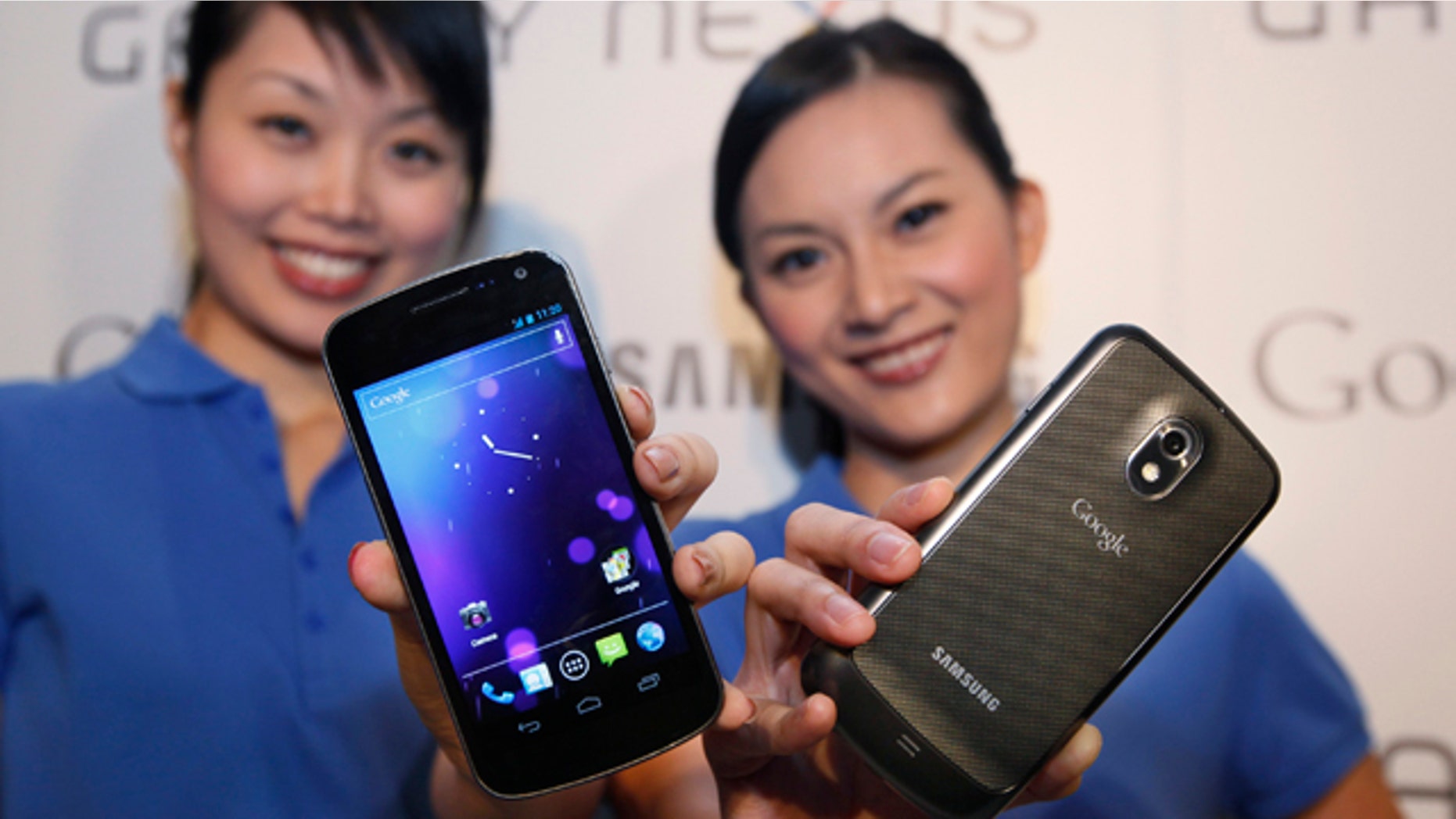 Oct. 19, 2011: Models display the new Galaxy Nexus smartphone -- the first to use the latest version of Google's Android operating system -- during a news conference in Hong Kong.