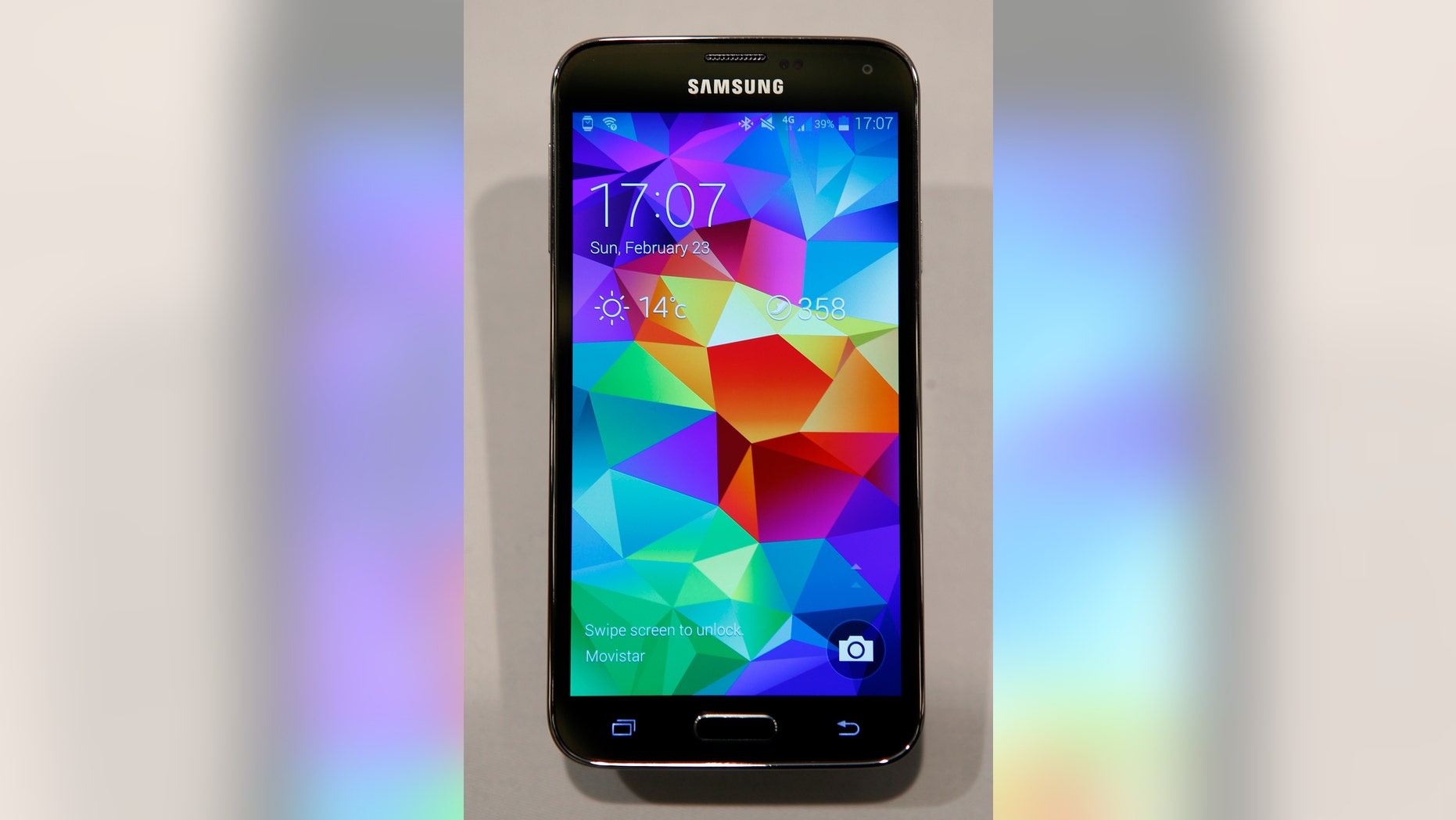File photo - A new Samsung Galaxy S5 smartphone is seen on a display at the Mobile World Congress in Barcelona Feb. 23, 2014.