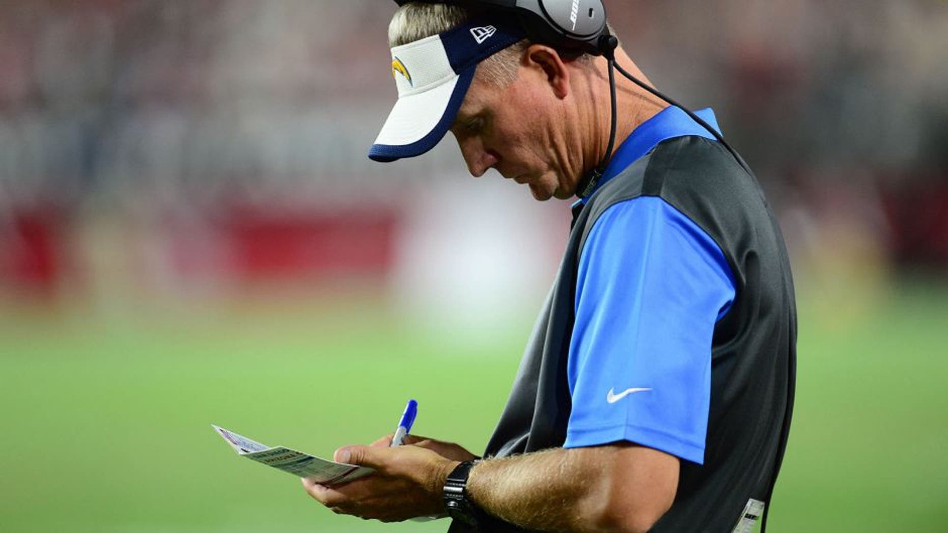 Aug 22, 2015; Glendale, AZ, USA; San Diego Chargers head coach Mike McCoy looks on against the Arizona Cardinals during the first half at University of Phoenix Stadium. The Chargers won 22-19. Mandatory Credit: Joe Camporeale-USA TODAY Sports