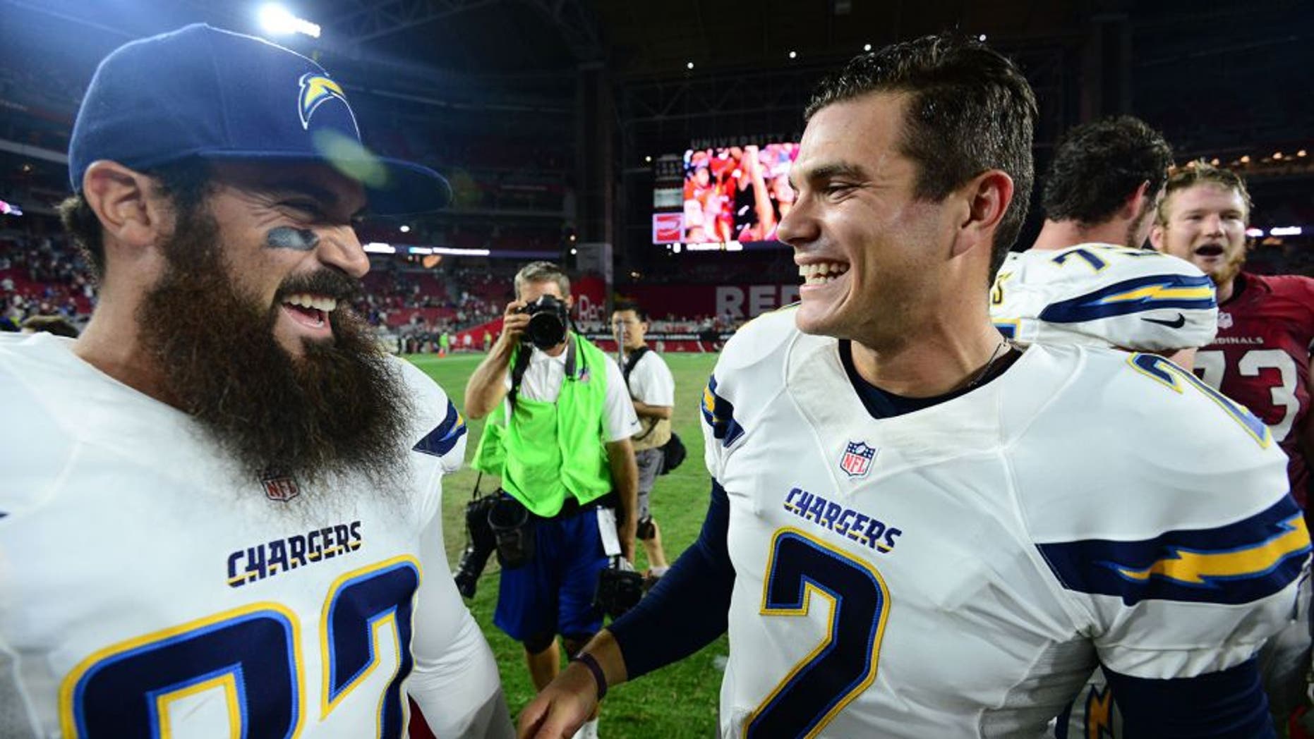 Aug 22, 2015; Glendale, AZ, USA; San Diego Chargers kicker Josh Lambo (2) celebrates with teammates after kicking a game winning field goal against the Arizona Cardinals during the second half at University of Phoenix Stadium. The Chargers won 22-19. Mandatory Credit: Joe Camporeale-USA TODAY Sports