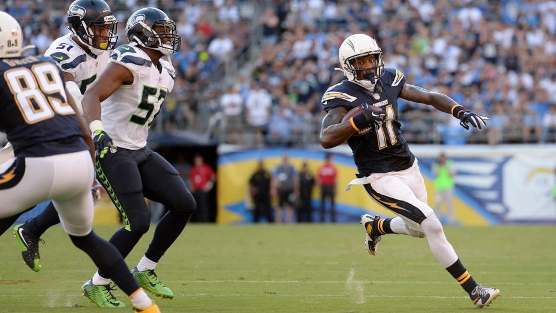 Aug 29, 2015; San Diego, CA, USA; San Diego Chargers wide receiver Steve Johnson (11) runs after making a catch during the second quarter against the Seattle Seahawks at Qualcomm Stadium. Mandatory Credit: Jake Roth-USA TODAY Sports