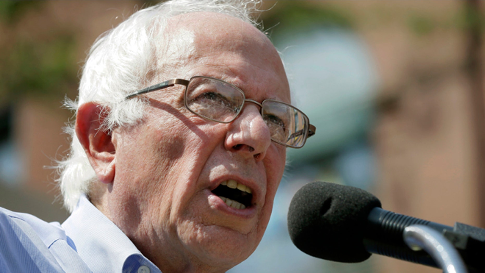 Democratic presidential candidate, Sen. Bernie Sanders, I-Vt., speaks during the opening of his Cedar Rapids field headquarters, Sunday, Aug. 16, 2015, in Marion, Iowa. (AP Photo/Charlie Neibergall)