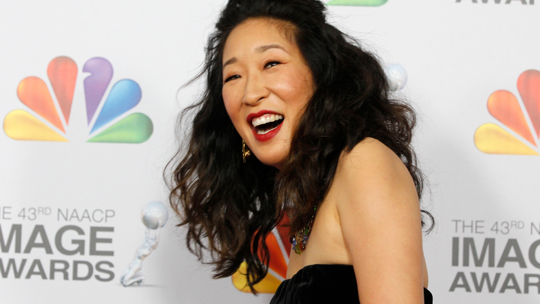 Actress Sandra Oh arrives at the 43rd NAACP Image Awards in Los Angeles, California February 17, 2012.