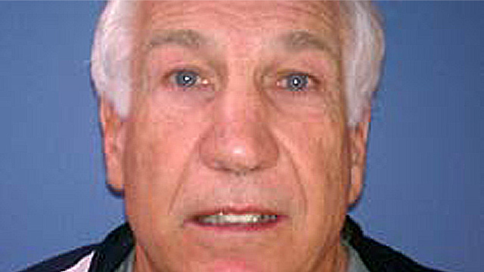 December 6, 2011: Booking photo of Jerry Sandusky provided by the Pennsylvania Attorney General's office.