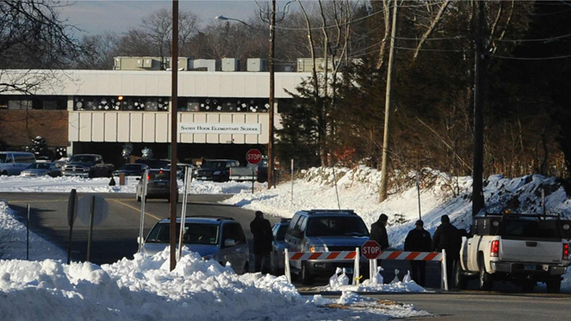 Jan. 3: Police road block is at the entrance to the new Sandy Hook Elementary School on the first day of classes in Monroe, Conn.