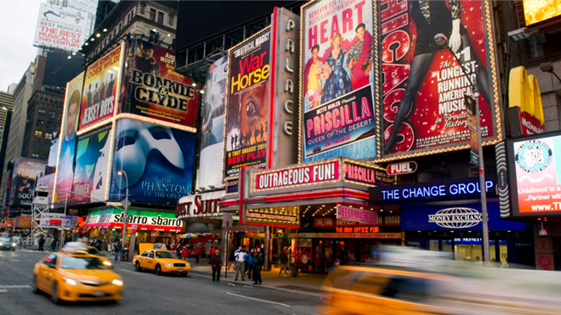 Jan. 19, 2012: This file photo shows billboards advertising Broadway shows in Times Square, in New York.