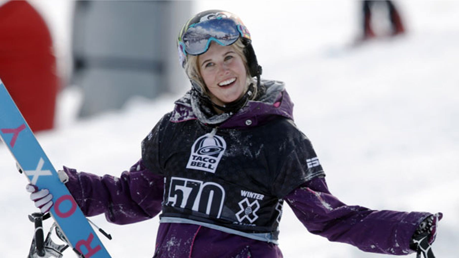 In a Jan. 28, 2010, file photo, Sarah Burke, of Canada, reacts after failing to place in the top-three finishers in the slopestyle skiing women's final at the Winter X Games at Buttermilk Mountain outside Aspen, Colo.