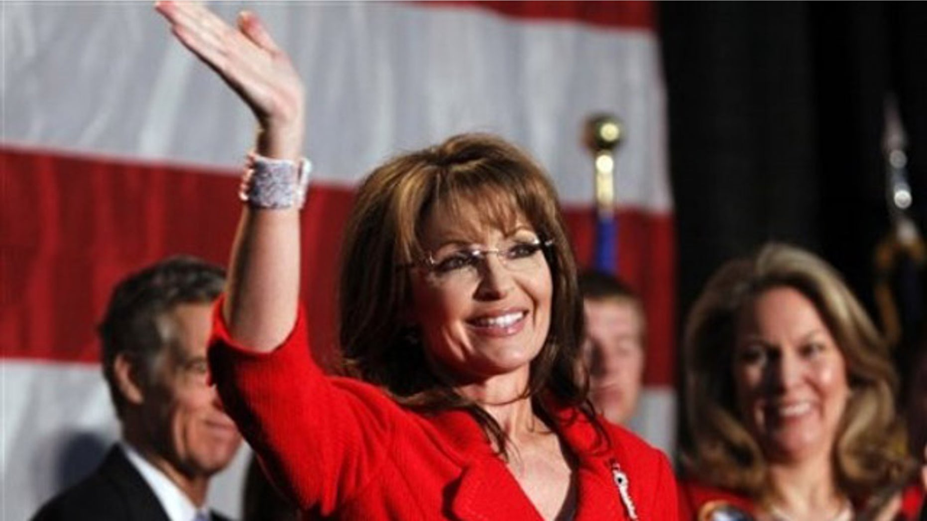 May 2: Former Alaska Governor Sarah Palin waves during a fund raiser at Colorado Christian University in Lakewood, Colo. (AP).