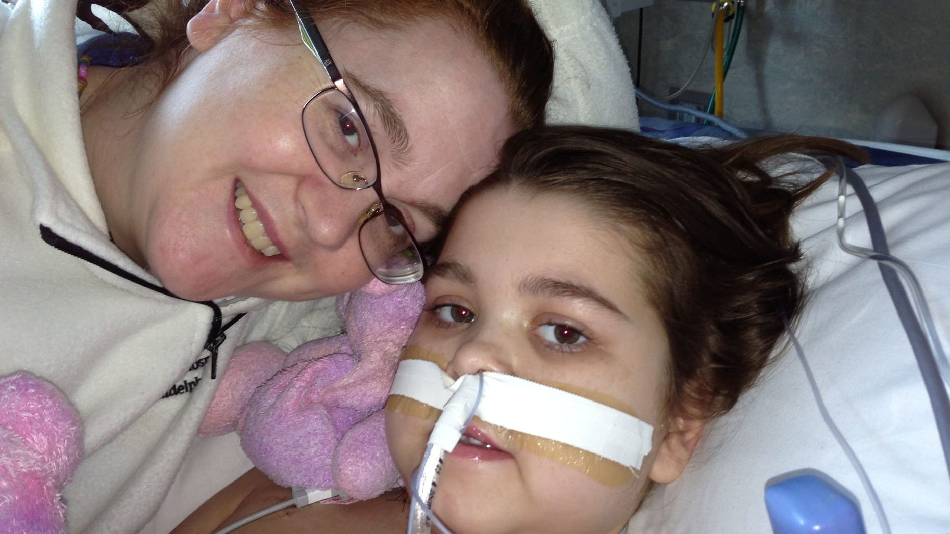 Sarah Murnaghan (R) with her mother, Janet (L), on June 28, 2103, one week after her second surgery.