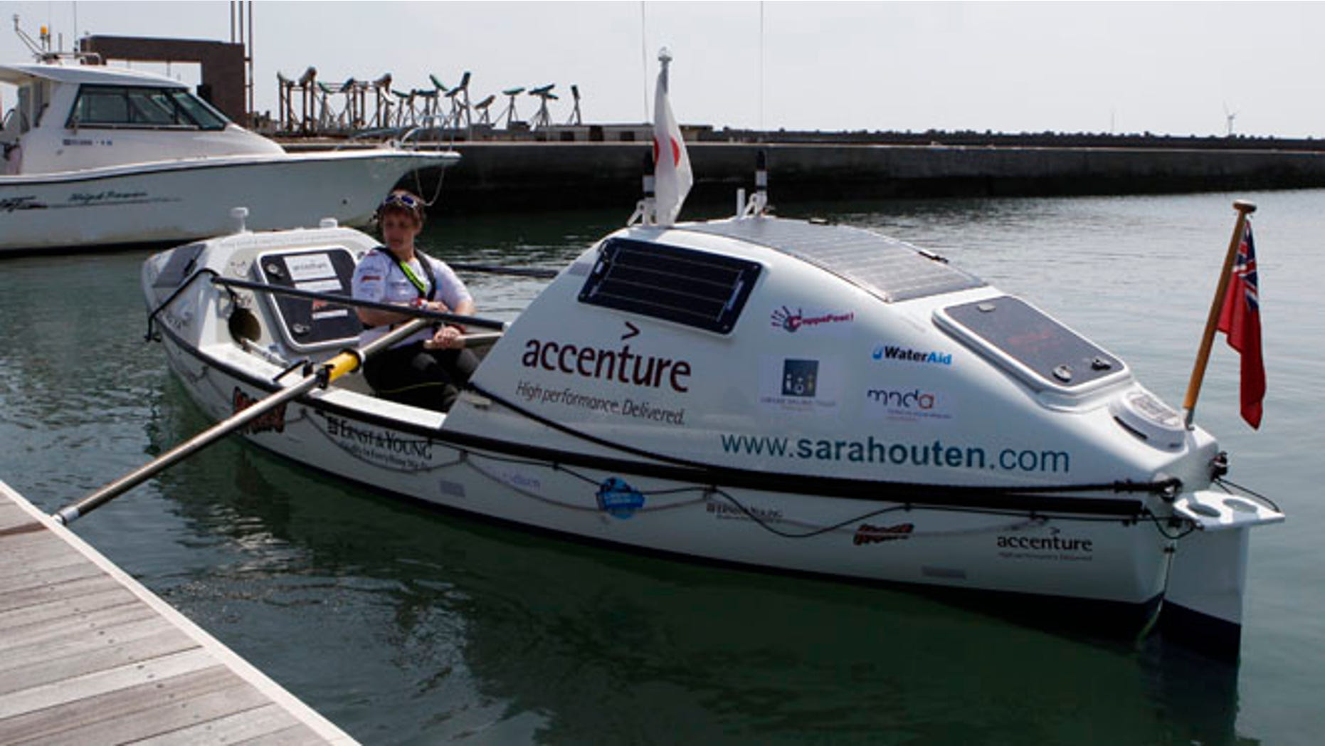 April 4, 2013: Briton Sarah Outen rows her boat at a port in Chosi, east of Tokyo April 4, 2013.