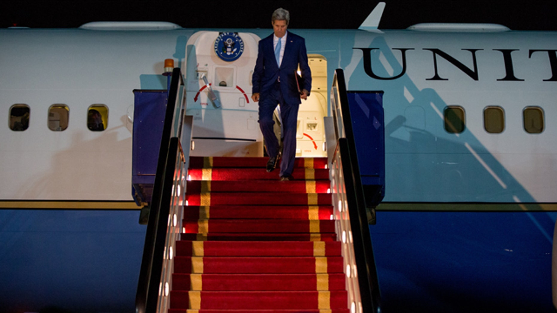 May 6, 2015: U.S. Secretary of State John Kerry arrives at Riyadh Air Base in Saudi Arabia to push Saudi officials for a pause in Yemen's war, citing increased shortages of food, fuel and medicine that are adding to a crisis that already has neighboring countries bracing for a mass exodus of refugees. (AP Photo/Andrew Harnik, Pool)