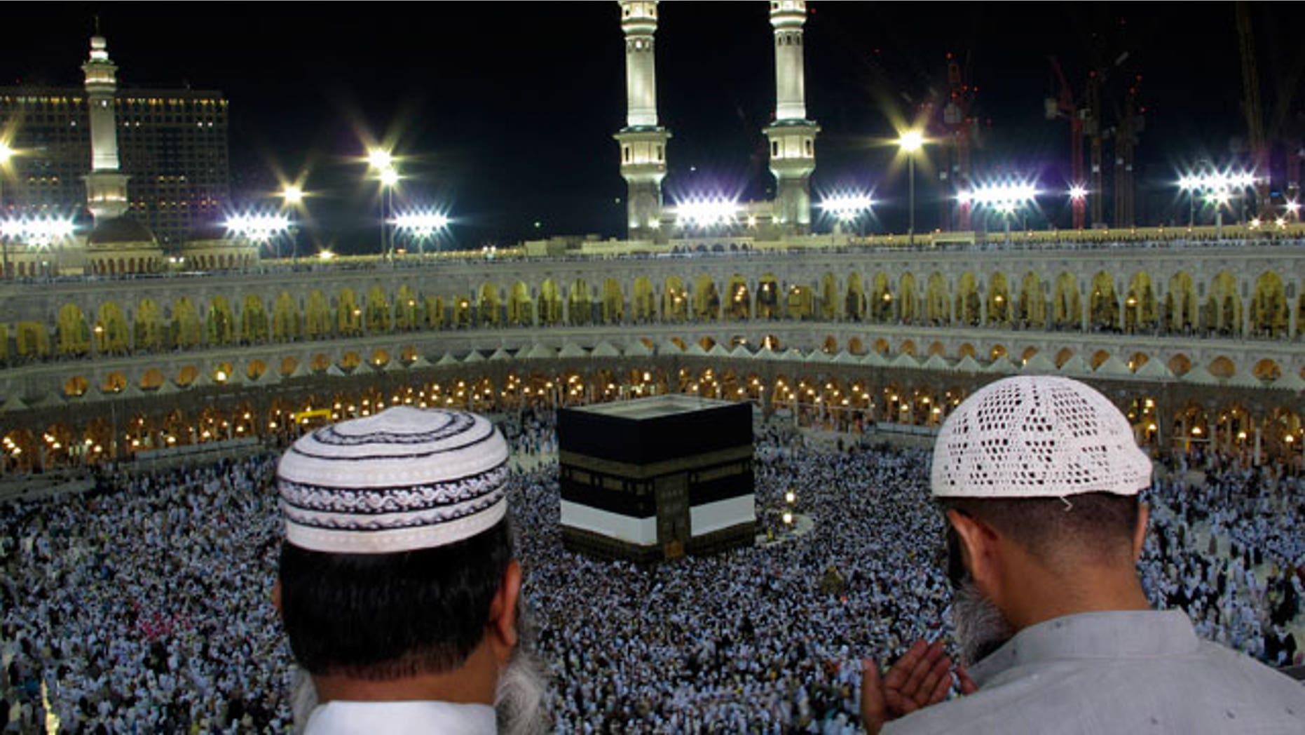 Muslim pilgrims pray as tens of thousands of Muslim pilgrims moving around the Kaaba, the black cube seen at center, inside the Grand Mosque, during the annual Hajj Mecca, Saudi Arabia, Wednesday, Nov. 10, 2010. The annual Islamic pilgrimage draws 3 million visitors each year, making it the largest yearly gathering of people in the world.