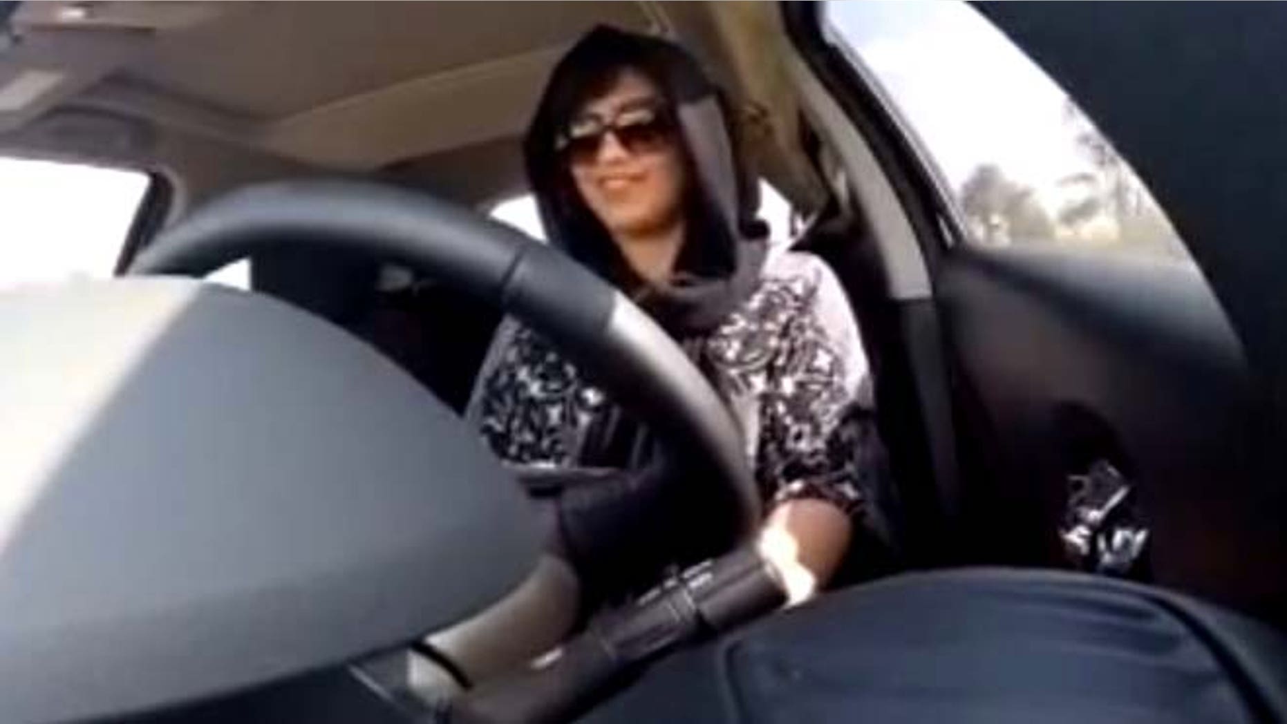This Nov. 30, 2014 image made from video released by Loujain al-Hathloul, shows her driving towards the United Arab Emirates - Saudi Arabia border before her arrest on Dec. 1, 2014, in Saudi Arabia. (AP/Loujain al-Hathloul)