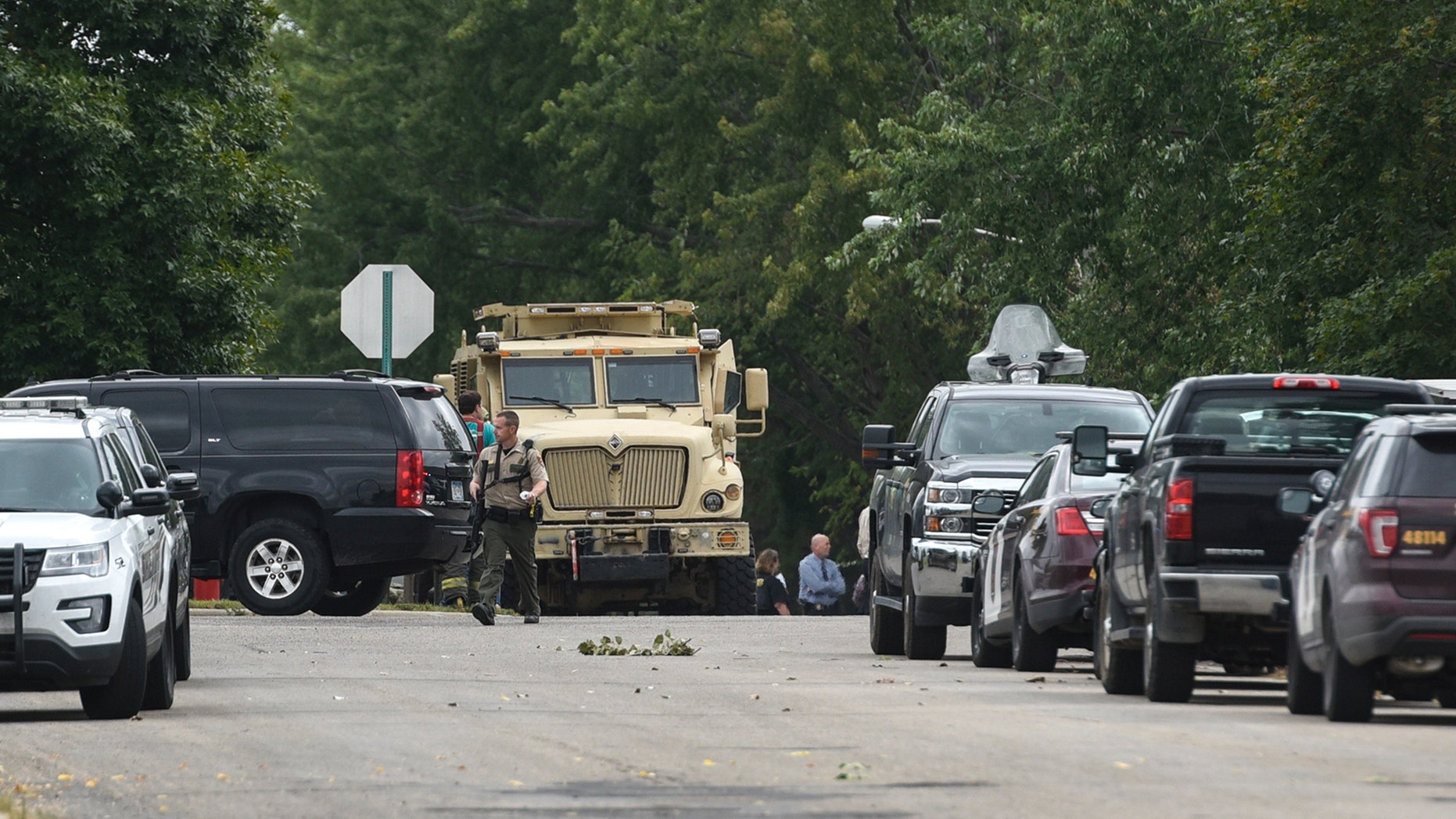 Law enforcement established a perimeter around where a deputy was shot with an arrow.