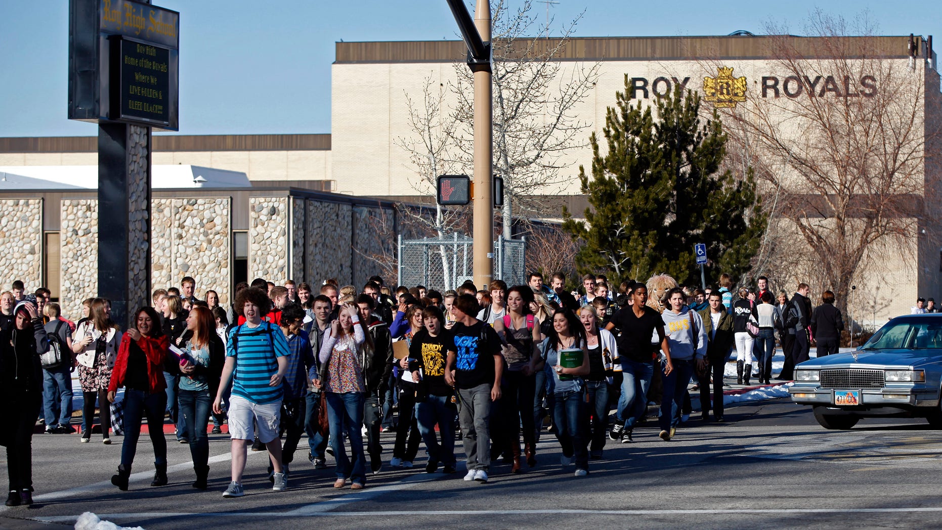 January 27: Students leave Roy High School at the end of the school day in Roy, Utah. Authorities have filed charges against a 16-year-old boy accused in a plot to detonate a bomb at a Utah high school.