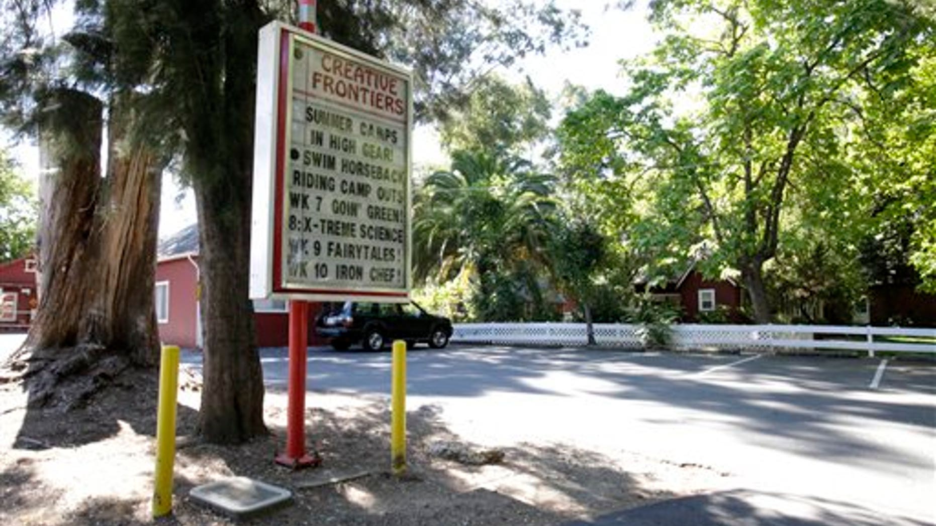 July 19: A welcome sign at the entrance to the Creative Frontiers preschool and elementary school is seen after California officials closed the private school amid accusations of child molestation, in Citrus Heights, Calif.