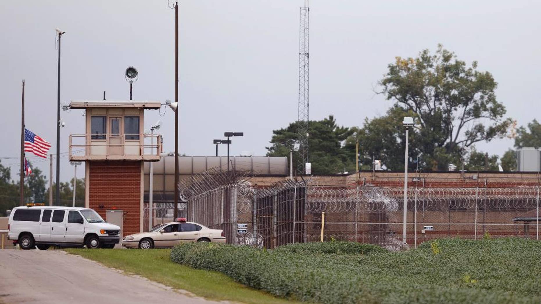 FILE - This Sept. 12, 2014 file photo shows the Allen Oakwood Correctional Institution in Lima, Ohio. Ohio's prisons department released details on Friday, Nov. 14, 2014, how T.J. Lane, a teenager convicted of killing three students at an Ohio high school, climbed over a fence to escape the state prison with two other prisoners in September. The convicted school shooter and two other inmates spent several months building a ladder that they used to escape from prison. (AP Photo/Rick Osentoski, File)