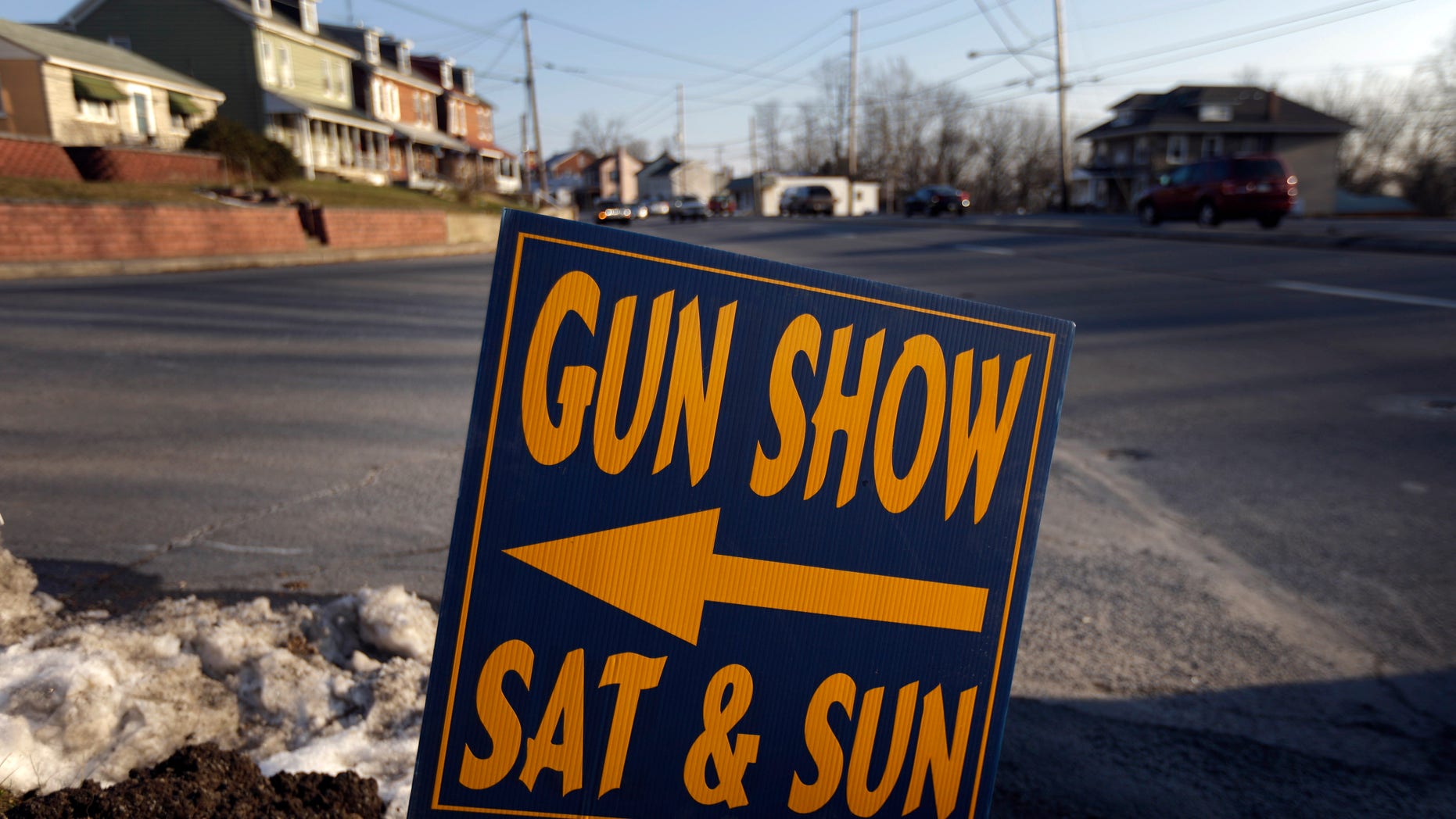 Jan. 4, 2012: A sign is posted for an upcoming gun show in Leesport, Pa.