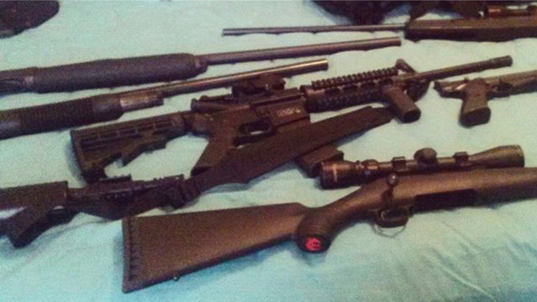 This photo posted on the Instagram account of Nikolas Cruz shows weapons lying on a bed.