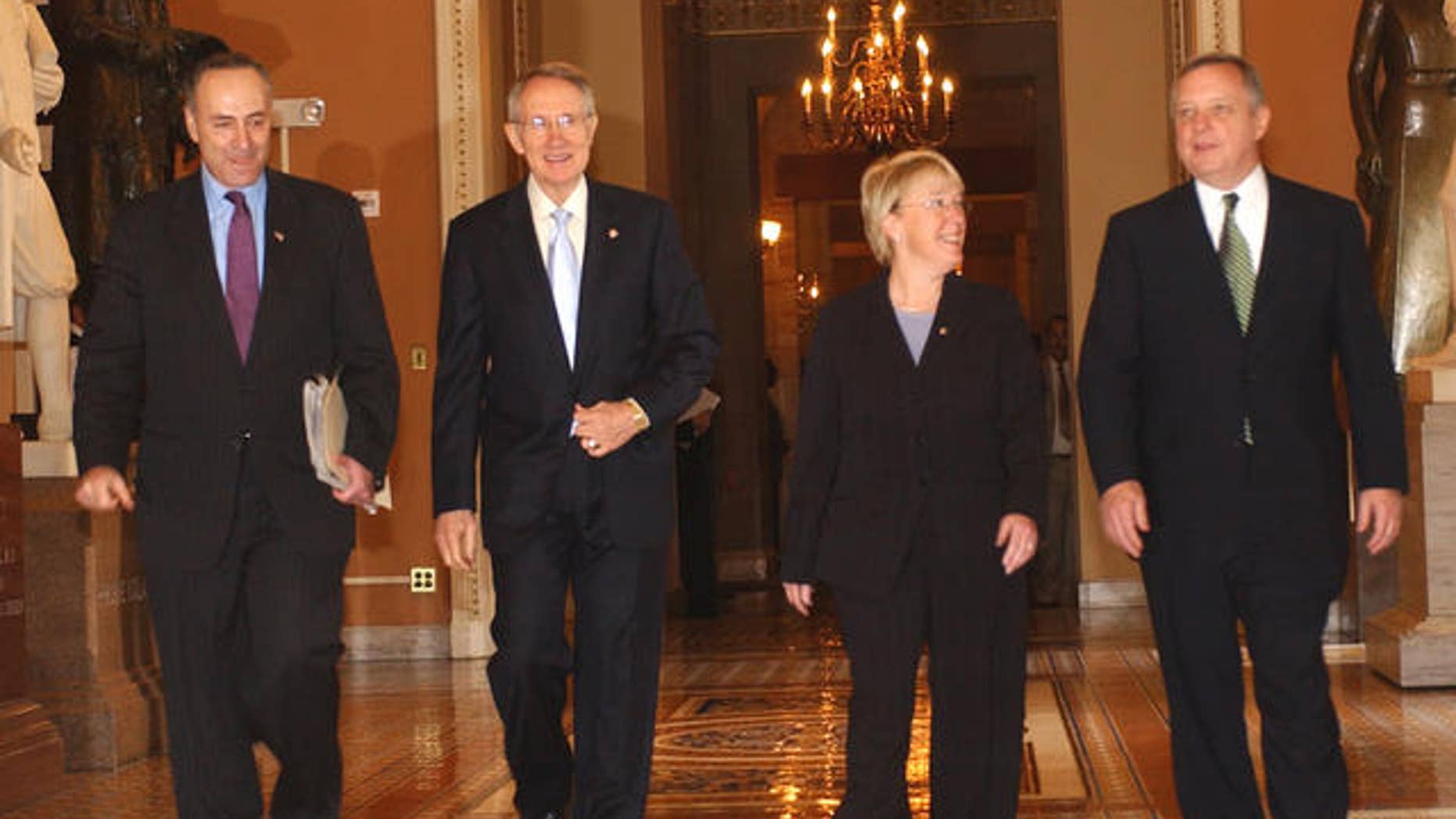 Incoming Senate Majority Leader Harry Reid of Nev., second from left, emerges from a Democratic caucus on Capitol Hill in Washington Tuesday. Nov. 14, 2006, after being elected incoming majority leader of the 110th congress. From left are Sen. Charles Schumer, D-N.Y., elected Democratic Conference vice chair; Reid; Sen. Patty Murray, D-Wash., elected conference secretary, and Sen. Richard Durbin, D-Ill., named assistant majority leader. (AP Photo/Dennis Cook)