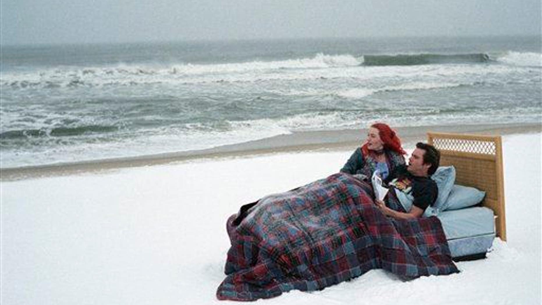 Kate Winslet, left, and Jim Carrey in a scene from the film "Eternal Sunshine of the Spotless Mind."