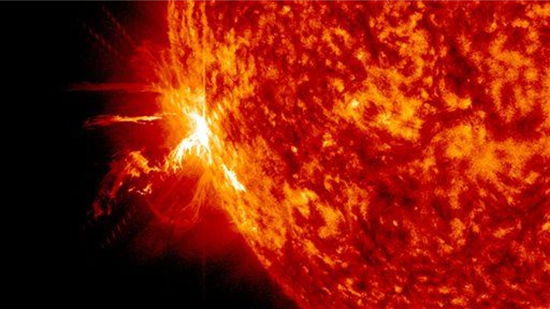 This image provided by NASA's Goddard Space Flight Center shows a significant solar flare erupting on June 10, 2014.