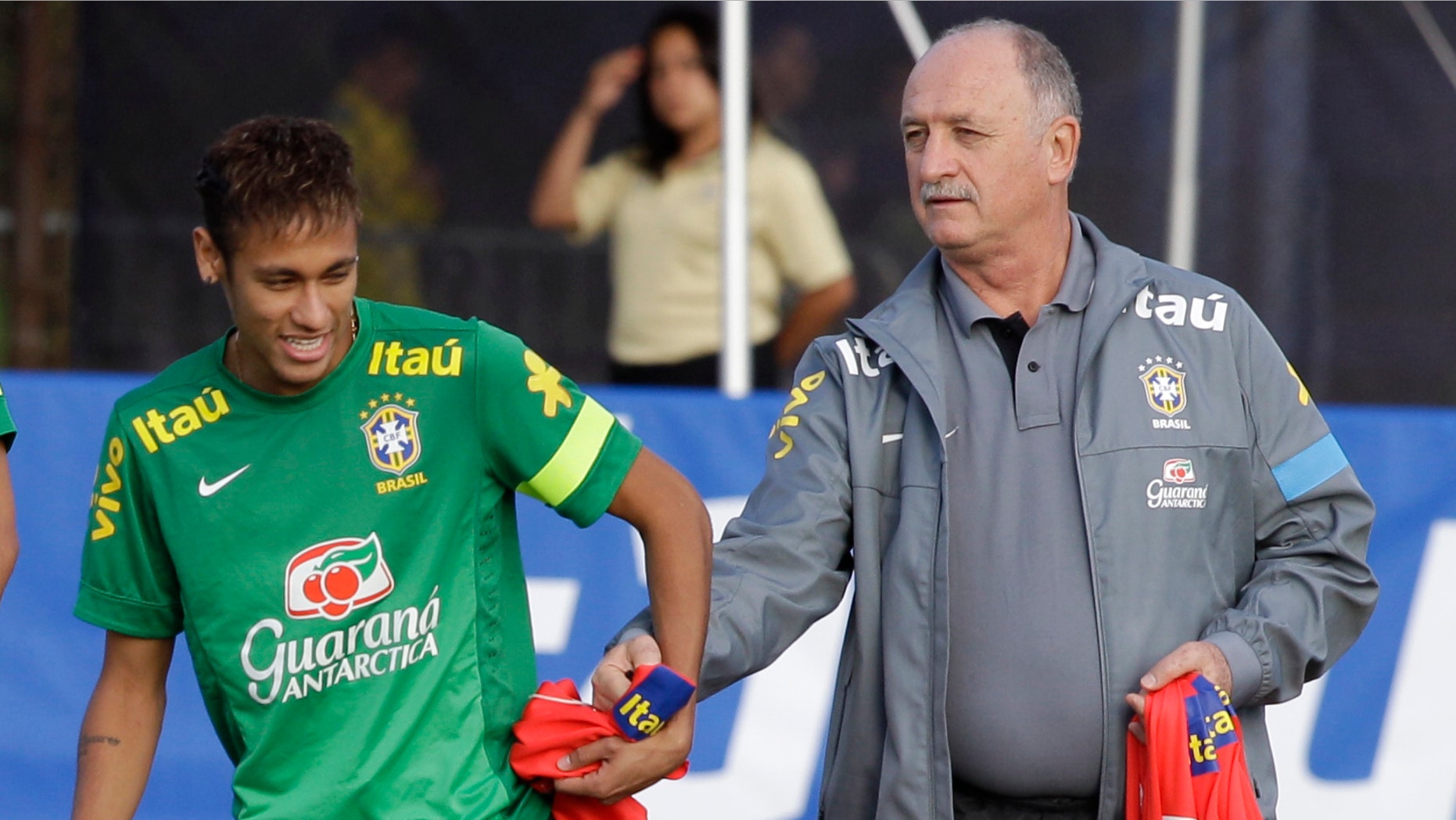 Brazil coach Luis Felipe Scolari, right, with star striker, Neymar, during a national team practice on Nov. 14, 2013 (AP/Javier Galeano)