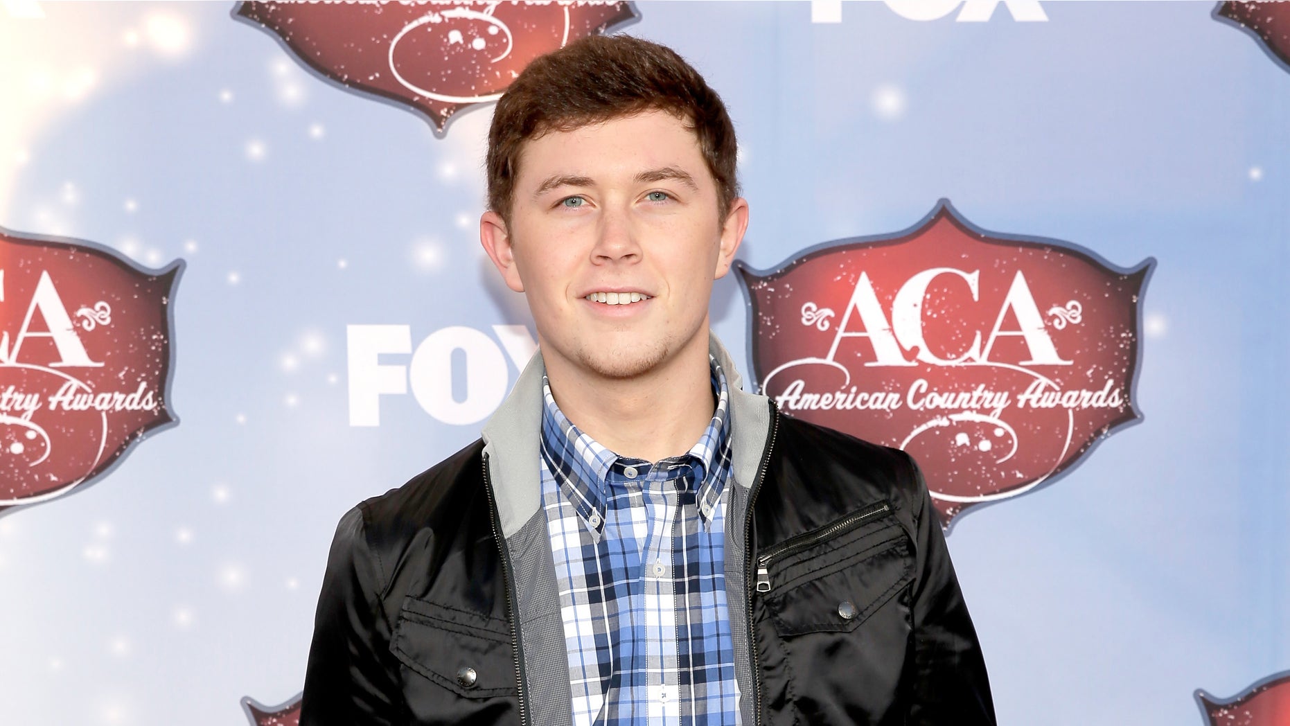 LAS VEGAS, NV - DECEMBER 10: Recording artist Scotty McCreery arrives at the American Country Awards 2013 at the Mandalay Bay Events Center on December 10, 2013 in Las Vegas, Nevada. (Photo by Isaac Brekken/Getty Images)