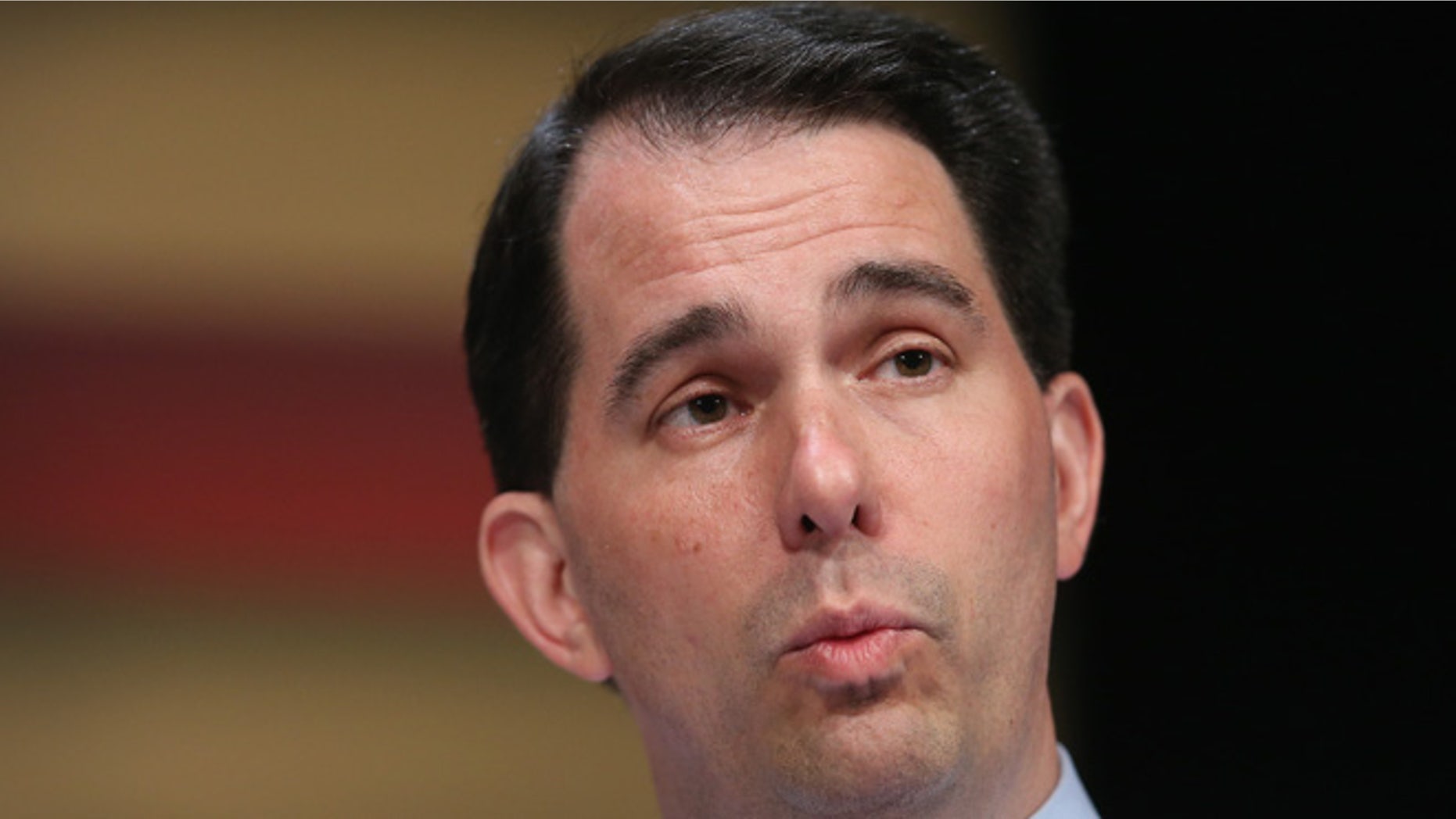 Republican presidential candidate Wisconsin Governor Scott Walker fields questions at The Family Leadership Summit at Stephens Auditorium on July 18, 2015 in Ames, Iowa. (Photo by Scott Olson/Getty Images)