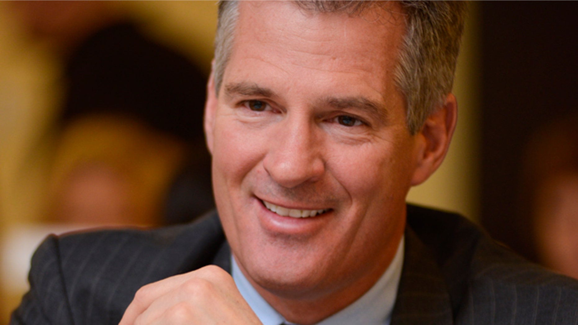 April 4, 2013: Former U.S. Sen. Scott Brown of Massachusetts sits at a table during the 11th Annual "Keeping the Dream Alive" dinner commemorating the anniversary of Martin Luther King Jr.'s death.