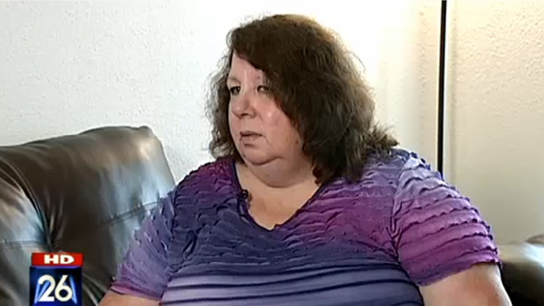 Toni Searcy says a moving company refuses to hand over her husband's ashes after she is unable to come up with the money to pay for a recent move.