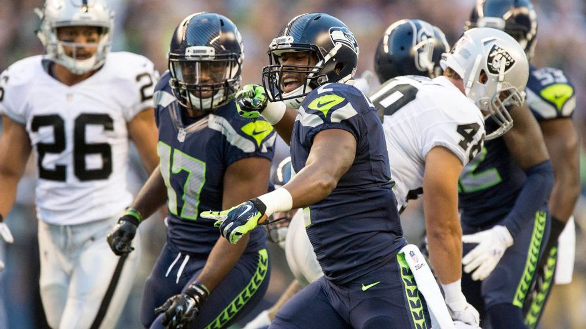 Sep 3, 2015; Seattle, WA, USA; Seattle Seahawks strong safety Keenan Lambert (2) celebrates after making a defensive play in a game against the Oakland Raiders during the first quarter at CenturyLink Field. Mandatory Credit: Troy Wayrynen-USA TODAY Sports
