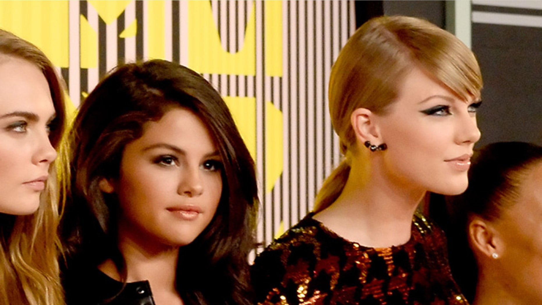 LOS ANGELES, CA - AUGUST 30: (L-R) Model Cara Delevingne, recording artists Selena Gomez and Taylor Swift attend the 2015 MTV Video Music Awards at Microsoft Theater on August 30, 2015 in Los Angeles, California. (Photo by Frazer Harrison/Getty Images)