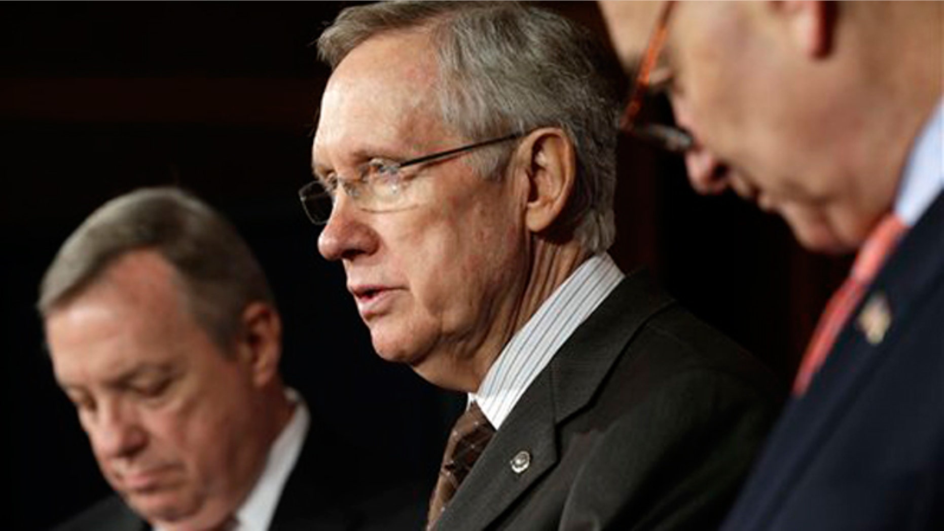 Jan. 31, 2013: Senate Majority Harry Reid, D-Nev., center, with Senate Majority Whip Sen. Dick Durbin, D-Ill., left, and Sen. Chuck Schumer, D-NY., right, answer question regarding immigration reform on Capitol Hill in Washington.