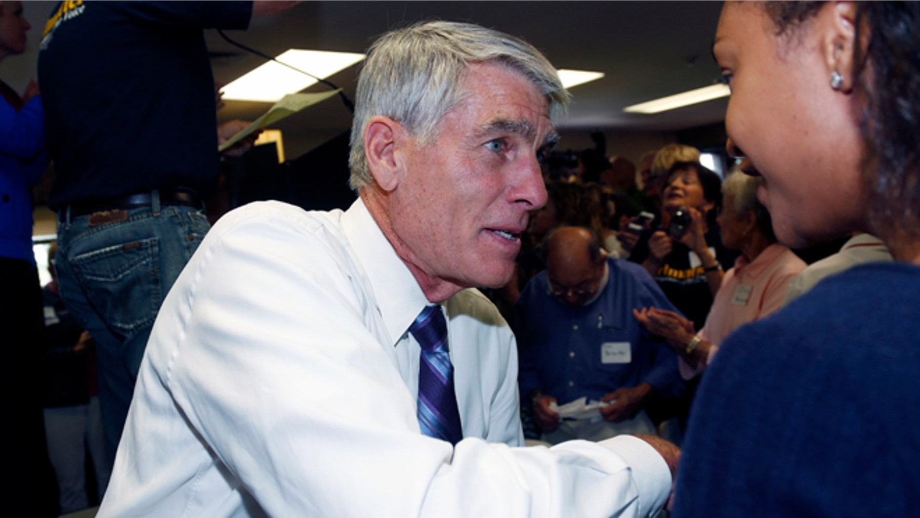 In this Friday, Sept. 5, 2014 photo, U.S. Sen. Mark Udall, D-Colo., is at a campaign headquarters in the northwest Denver suburb of Wheat Ridge.