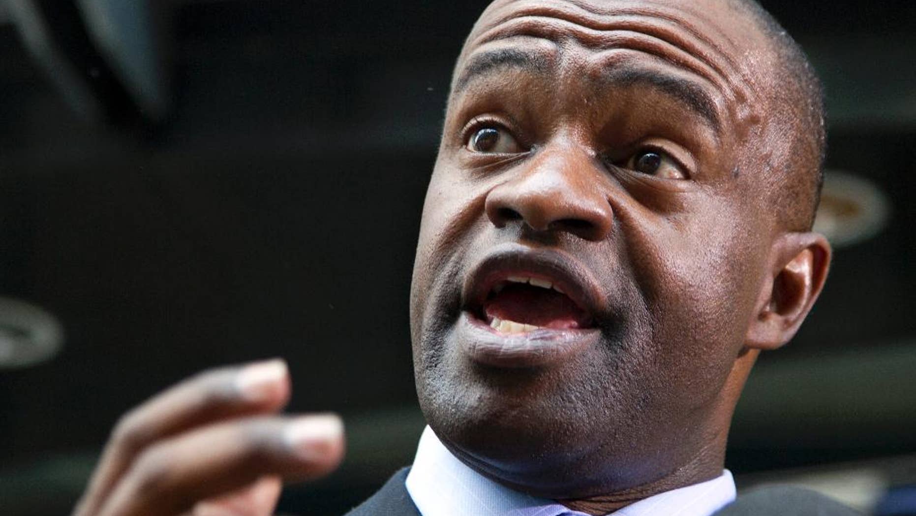 FILE - In this May 24, 2012, file photo, NFL players union chief DeMaurice Smith speaks during a news conference outside their headquarters in Washington. The head of the NFL Players Association says the union is establishing an eight-member commission to advise it about domestic violence prevention and discipline. The head of the NFL Players Association says the union is establishing an eight-member commission to advise it about domestic violence prevention and discipline. In a letter sent Monday, Dec. 1, 2014, to Sen. Jay Rockefeller, the West Virginia Democrat who chairs the Senate Commerce Committee, NFLPA Executive Director DeMaurice Smith writes that "when these matters are left solely to the NFL, the process is mismanaged and often the end result has not been able to withstand outside review." (AP Photo/Carolyn Kaster, File)