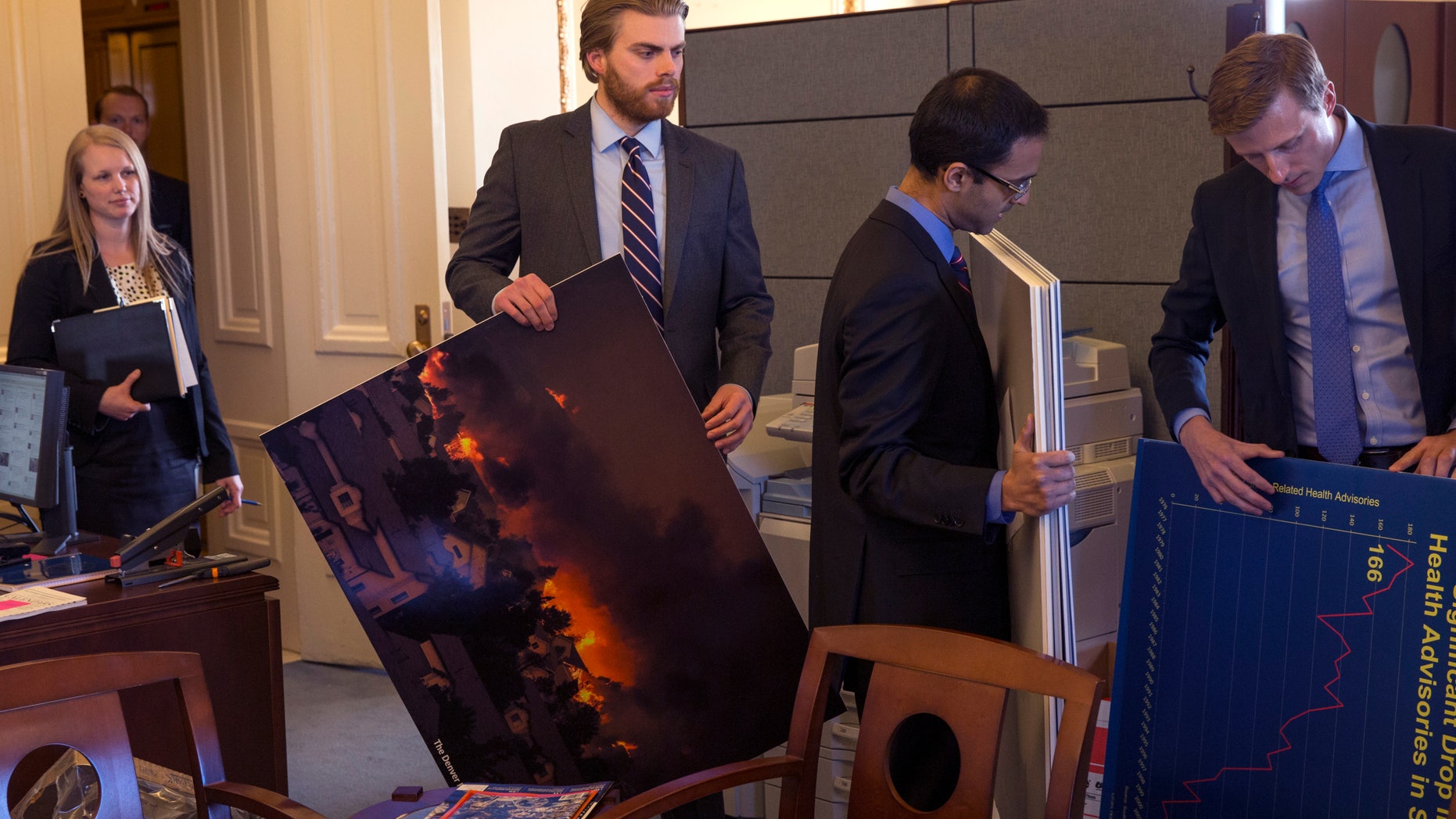 March 10, 2014: Senate staff members arrive prior to a meeting of the Senate Climate Action Task Force prior to taking to the Senate Floor all night to urge action on climate change on Capitol Hill.