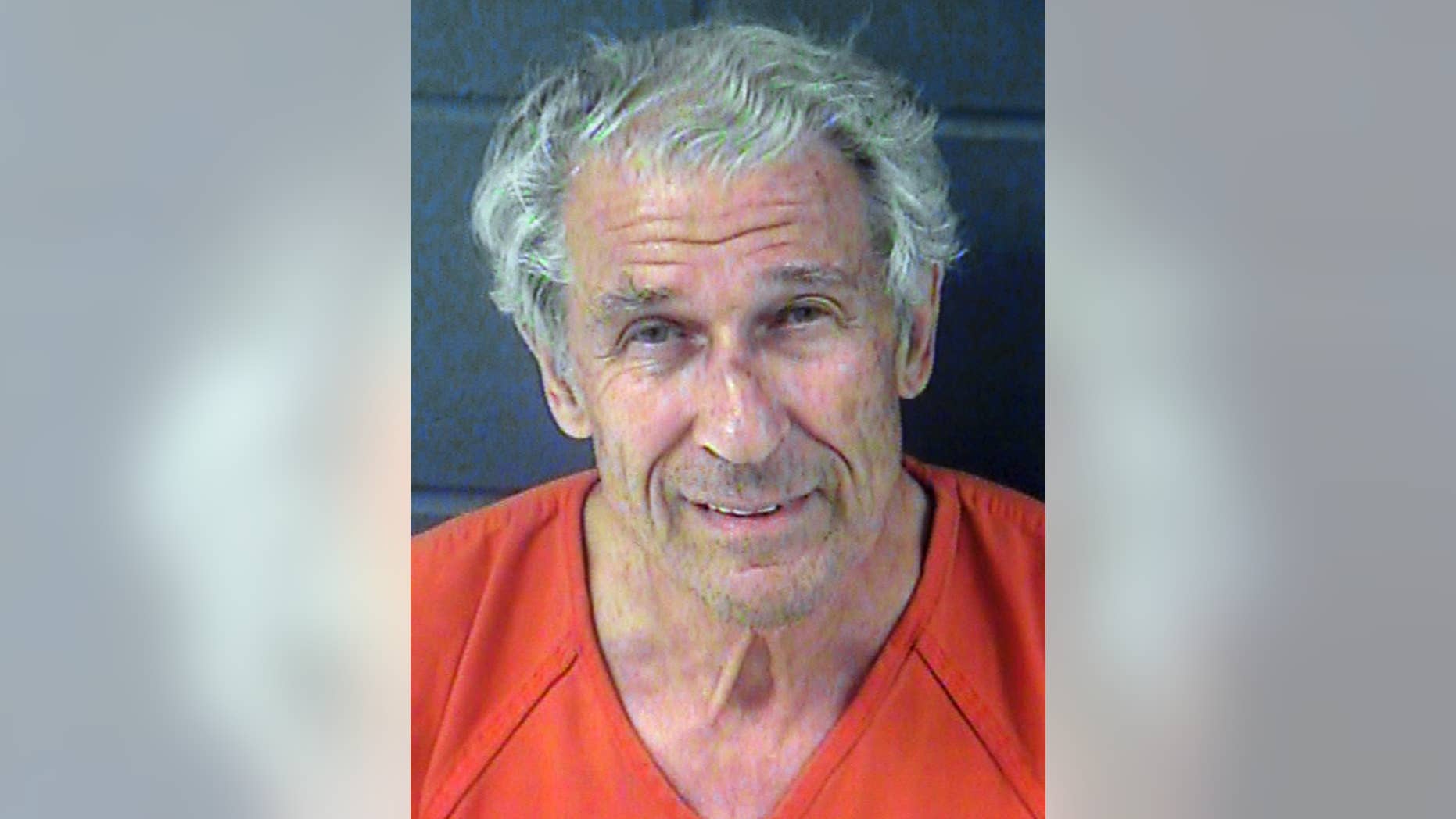 This June 2013 booking photo provided by the Junction City, Kan., Police Department shows Marshall Dion of Tucson, Ariz. (AP Photo/Junction City Police Department)