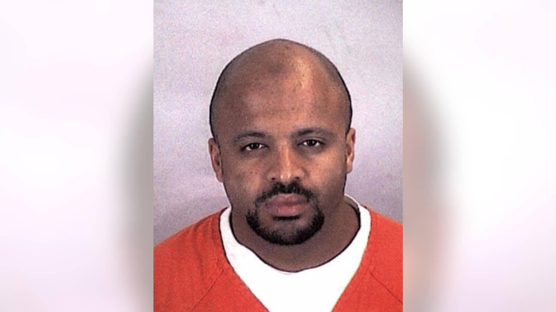 FILE - In this undated file photo provided by the Sherburne County Sheriff Office, Zacarias Moussaoui is shown. Lawyers for victims of the Sept. 11 attacks say in a lawsuit that they have amassed new evidence that agents of Saudi Arabia "knowingly and directly" helped the hijackers. They say they have obtained sworn testimony from Moussaoui, the so-called 20th hijacker to support their claims. The Embassy of Saudi Arabia in Washington said in a statement Wednesday, Feb. 4, 2015, that Moussaoui's claims come from a "deranged criminal" and there is no evidence to support them.(AP Photo/Sherburne County, Minn., Sheriff's Office, File)
